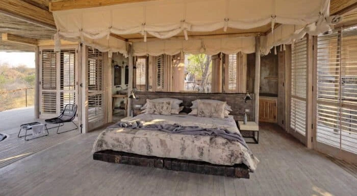 Premium lodge suite with panoramic savannah views