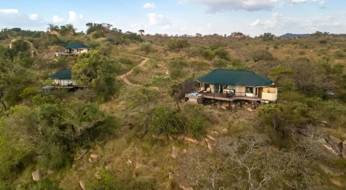 Premium lodge suite with panoramic savannah views