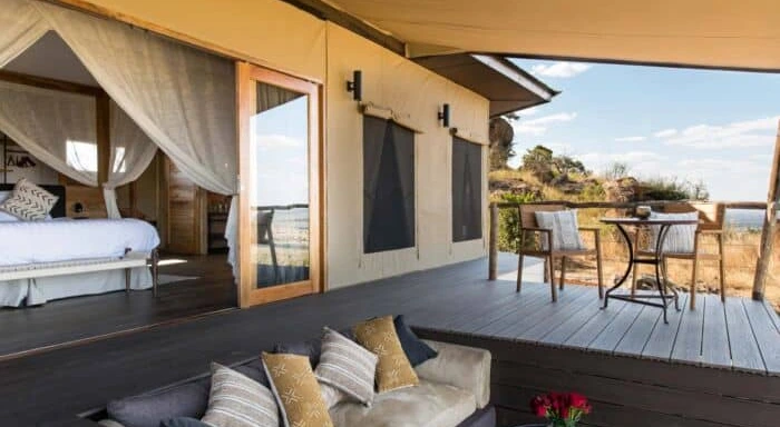 Sunset lounge and outdoor firepit at safari camp